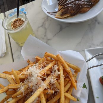 Blue Daisy - Garlic fries & Nutella crepes in the back. - Creperies Near Me - Santa Monica, California Blue Daisy - Garlic fries & Nutella crepes in the back. - Creperies Near Me - Santa Monica, California