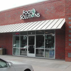 Foot Solutions - Between Sams Club and Kickback Jacks on West Broad St.