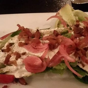 Stone Creek Bistro - Wedge Salad, head of Romaine halved, pickled onions, bacon, cherry tomatoes and made on site blue cheese dressing. - New American Near Me - Blue Jay, California Stone Creek Bistro - Wedge Salad, head of Romaine halved, pickled onions, bacon, cherry tomatoes and made on site blue cheese dressing. - New American Near Me - Blue Jay, California