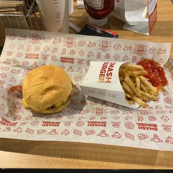 Smashburger - a burger and fries on a table - Fast Food Near Me - Coon Rapids, Minnesota