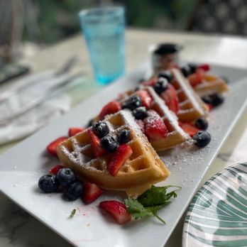 Blue Daisy - Waffles with strawberries, blueberries, & sprinkled with powdered sugar - Creperies Near Me - Santa Monica, California Blue Daisy - Waffles with strawberries, blueberries, & sprinkled with powdered sugar - Creperies Near Me - Santa Monica, California