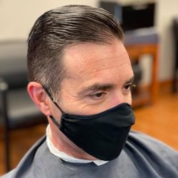 Roosters Men's Grooming Center