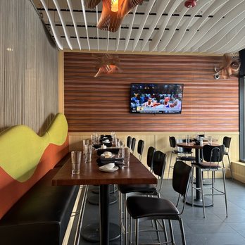 Nabuki - a dining area with a flat screen tv - Japanese Near Me - Hinsdale, Illinois Nabuki - a dining area with a flat screen tv - Japanese Near Me - Hinsdale, Illinois