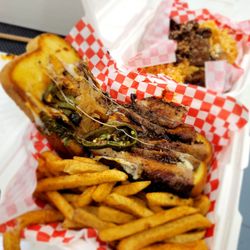 Charly's BBQ & Grill - Brisket sandwich with seasoned fries