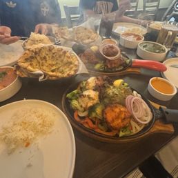 Trio kebab, Chili & garlic naan, tandoori chickens paneer, butter chicken Trio kebab, Chili & garlic naan, tandoori chickens paneer, butter chicken