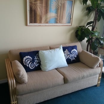 Tuckaway Shores Resort - Tropical sofa. - Hotels Near Me - Indialantic, Florida