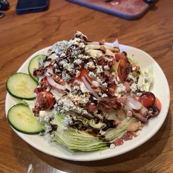 Outback Steakhouse - Bleu cheese wedge salad (my hubby added his salad cucumbers to my salad) - Steakhouses Near Me - Ontario, California