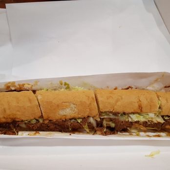 St Rose Tavern - Large Roast Beef Po Boy - Cajun/Creole Near Me - New Sarpy, Louisiana St Rose Tavern - Large Roast Beef Po Boy - Cajun/Creole Near Me - New Sarpy, Louisiana