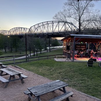 Neighbor's Kitchen & Yard - Casual, dog -friendly seating down below the main dining areas. - Pizza Near Me - Bastrop, Texas Neighbor's Kitchen & Yard - Casual, dog -friendly seating down below the main dining areas. - Pizza Near Me - Bastrop, Texas