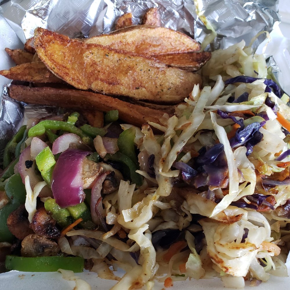 Fed’s Bubble - Chop steak with sautéed cabbage and garlic herb potato wedges. - Burgers Near Me - Grayson, Georgia