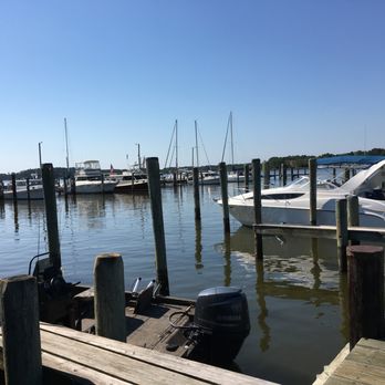 Palm Beach Willies - a dock with several boats - American Near Me - Taylors Island, Maryland Palm Beach Willies - a dock with several boats - American Near Me - Taylors Island, Maryland