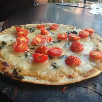 CRāVing Restaurant - White pizza from CRAVing -- thin, garlic-y and tasty - New American Near Me - Buffalo, New York CRāVing Restaurant - White pizza from CRAVing -- thin, garlic-y and tasty - New American Near Me - Buffalo, New York
