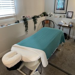 Atrium Wellness - Our massage room is designed with your comfort in mind, including the heat pad on the hydraulic table.