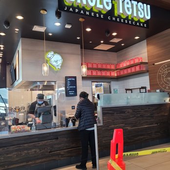 Uncle Tetsu - Front counter area. During covid, they have yellow taped lines to encourage social distancing and reduce crowding. - Desserts Near Me - San Mateo, California Uncle Tetsu - Front counter area. During covid, they have yellow taped lines to encourage social distancing and reduce crowding. - Desserts Near Me - San Mateo, California