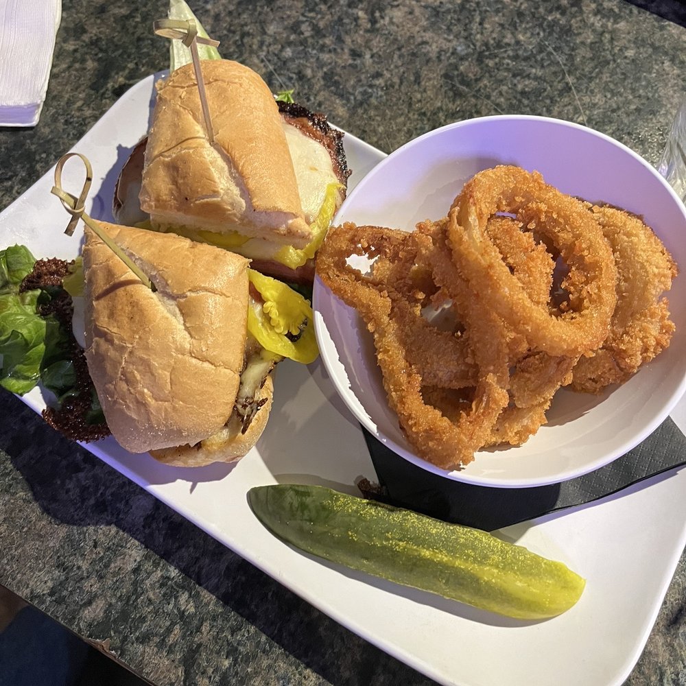 Johnny J's Pub & Grille - Italian sandwich, side of onion rings - Sports Bars Near Me - Akron, Ohio Johnny J's Pub & Grille - Italian sandwich, side of onion rings - Sports Bars Near Me - Akron, Ohio