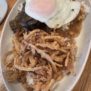 Mahi’ai Table - Short rib Loco moco- paired with onion strings was very tasty! - Cocktail Bars Near Me - Kapolei, Hawaii Mahi’ai Table - Short rib Loco moco- paired with onion strings was very tasty! - Cocktail Bars Near Me - Kapolei, Hawaii