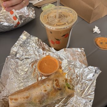 Wake and Late - Breakfast burrito with pickled jalapeños and chipotle aioli. Iced vanilla bean oatmilk latte on the side. - Breakfast & Brunch Near Me - Pasadena, California Wake and Late - Breakfast burrito with pickled jalapeños and chipotle aioli. Iced vanilla bean oatmilk latte on the side. - Breakfast & Brunch Near Me - Pasadena, California