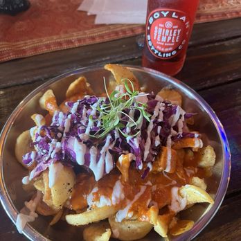 Twisted Indian - Yogi Fries with Paneer Tikka Masala - Indian Near Me - St. Petersburg, Florida Twisted Indian - Yogi Fries with Paneer Tikka Masala - Indian Near Me - St. Petersburg, Florida