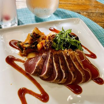 Surfing Deer - Yellowfin tuna entree served with forbidden black rice, kimchi, and gochujang glaze - Seafood Near Me - Seagrove Beach, Florida