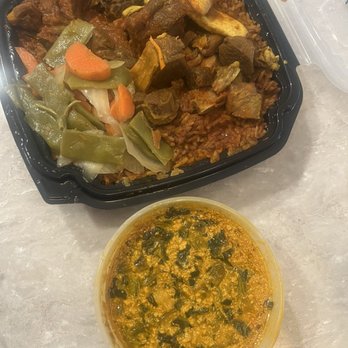 Fork in Nigeria - Jollof Rice Meal with Goat and Egusi Soup - African Near Me - Detroit, Michigan