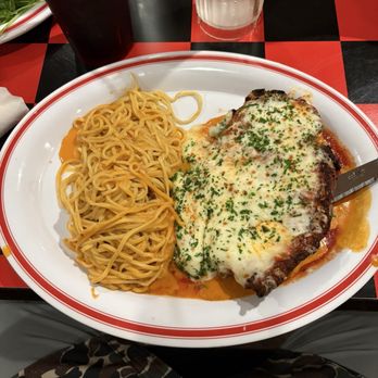 Vespa Rossa - Chicken Parmesan with vodka and marinara sauce - Italian Near Me - Dripping Springs, Texas Vespa Rossa - Chicken Parmesan with vodka and marinara sauce - Italian Near Me - Dripping Springs, Texas