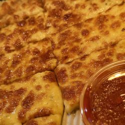 Angelo's Pizzeria - Cheesy breadsticks and marinara