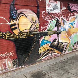 Alien Aiming a Crossbow - Left side of mural