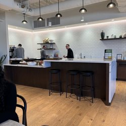 Industrious - shared kitchen space in the main area - free breakfast M-F!
