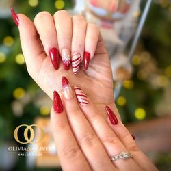 Olivia & Oliver Nail Lounge - Get into the holiday spirit with creative Christmas nail art! Call now to schedule your festive manicure.