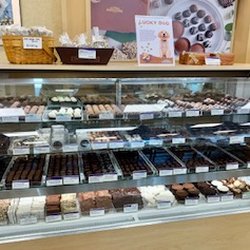 Rocky Mountain Chocolate Factory - 1 of 3 candy cases with endless varieties!