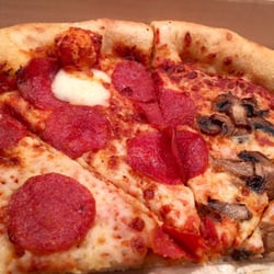 Pizza Hut - Hard to show in a picture. Looks like the dough has not risen.