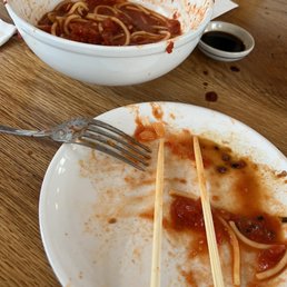 Overcooked spaghetti and watery marinara -- don't bother ordering this, it's terrible.  (Ate pasta with chopsticks as a goof.)
