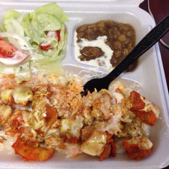 Royal Chicken & Gyro - Chicken over rice with hot sauce - Food Trucks Near Me