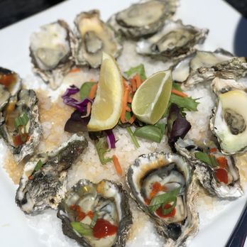 Jack's Seafood - Oysters: half raw with sriracha, green onions and tobiko, half BBQ'd with garlic, lemon and butter. (Cooked to perfection!) - Seafood Near Me - Eureka, California Jack's Seafood - Oysters: half raw with sriracha, green onions and tobiko, half BBQ'd with garlic, lemon and butter. (Cooked to perfection!) - Seafood Near Me - Eureka, California