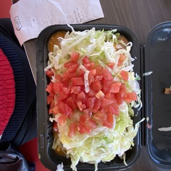 Deluxe smothered chorizo and egg loaded breakfast burrito!