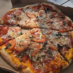 Delgada Pizza - Small Margarita Pizza $27 + tax and tip...