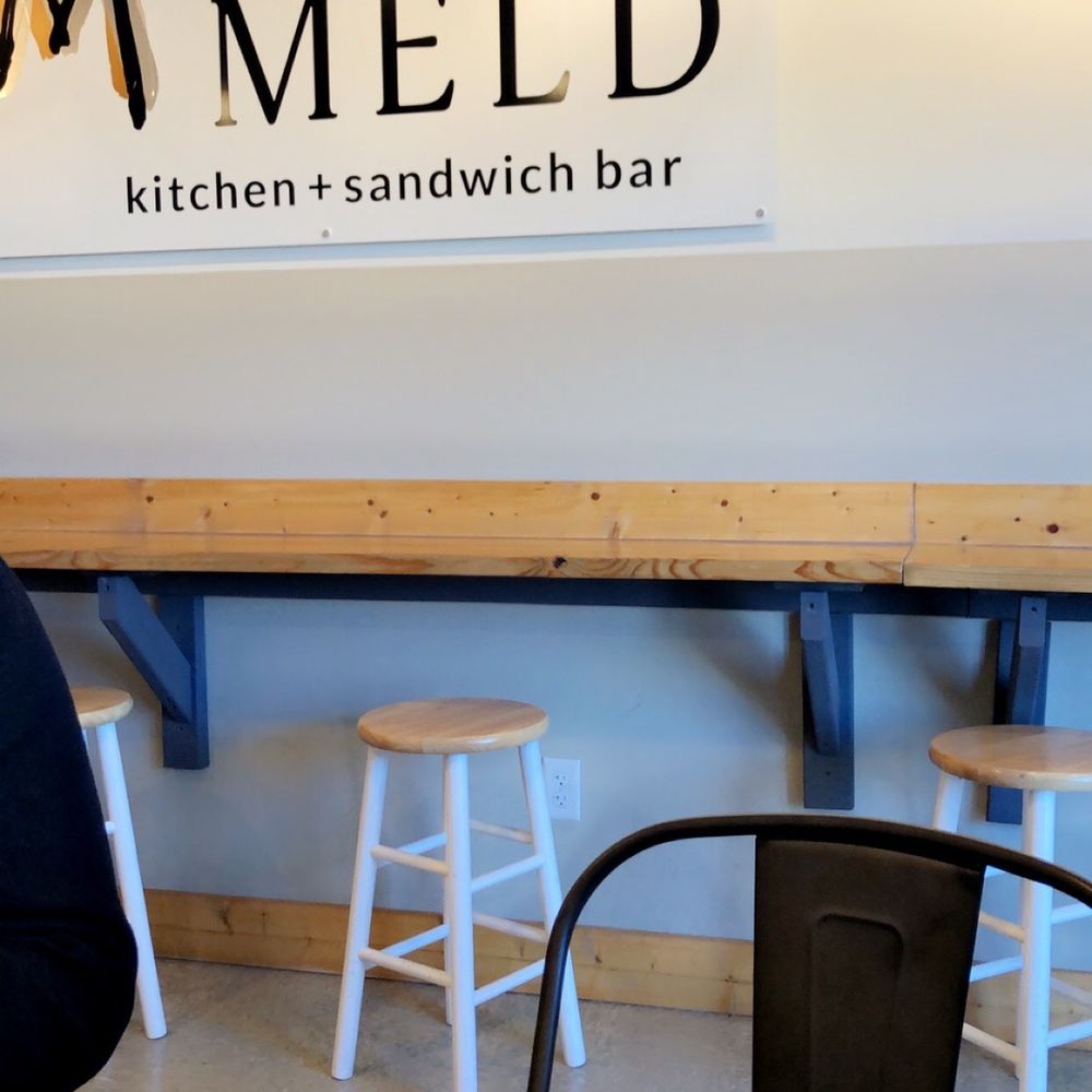 MELD Kitchen + Sandwich Bar - a woman standing in front of a sandwich bar - American Near Me - Bentonville, Arkansas MELD Kitchen + Sandwich Bar - a woman standing in front of a sandwich bar - American Near Me - Bentonville, Arkansas