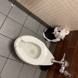 McDonald's - Overflowing trash in bathroom