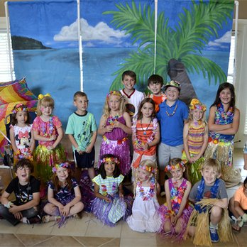 White Rabbit Escapades - Paused for a group picture during the Hawaiian Luau Party! - Party & Event Planning Near Me White Rabbit Escapades - Paused for a group picture during the Hawaiian Luau Party! - Party & Event Planning Near Me