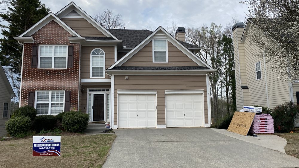 Slide of Check Roofing