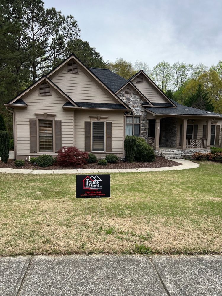 Slide of Tough As Nails Roofing Contractors