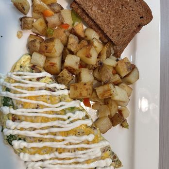 Easy Egg Cafe - Create your own omelette. Sausage, bacon, spinach and sour cream with home fries and wheat toast - Breakfast & Brunch Near Me - Quartz Hill, California