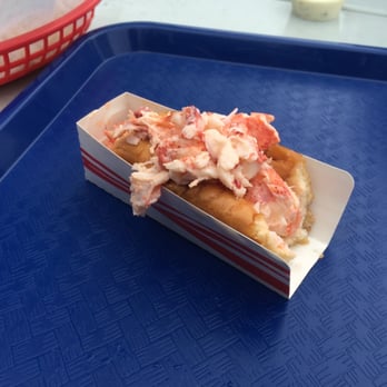 Bob's Clam Hut - Lobster roll with a bite taken - Seafood Near Me - Kittery, Maine Bob's Clam Hut - Lobster roll with a bite taken - Seafood Near Me - Kittery, Maine