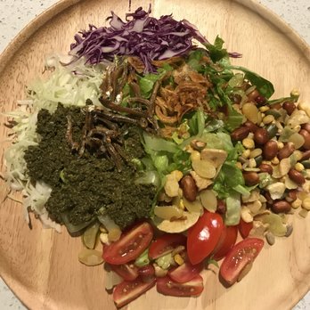 De' Rangoon -  wooden plate with a variety of vegetables - Street Vendors Near Me