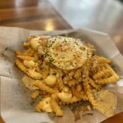 Seven Ten Social - Poutine so good!!  You don't see this on any menus on the Southside of Chicago.  Worth trip to get.