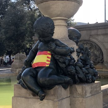 Plaça Catalunya - Cherubs marked by Catalan flags - Landmarks & Historical Buildings Near Me - Barcelona, B Plaça Catalunya - Cherubs marked by Catalan flags - Landmarks & Historical Buildings Near Me - Barcelona, B