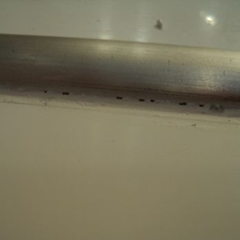 Arizona Grout Restoration - 5_gaps_in_caulk_on_shower_threshold - Grout Services Near Me - Phoenix, Arizona