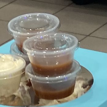 Cinnabon - a variety of desserts in plastic containers - Bakeries Near Me - Dulles, Virginia