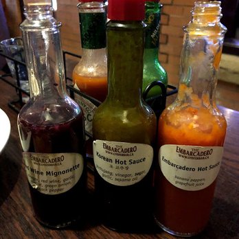 Embarcadero Wine & Oyster Bar - Homemade hot sauces for the oysters - Seafood Near Me - Calgary, Alberta