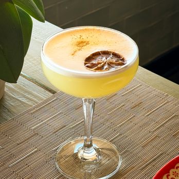 Mae Ornnit Thai Kitchen - Mixed Drink: Don't tell Ornnit.
sapphire gin, egg white, S&S, peach syrup - Thai Near Me - Annandale, Virginia